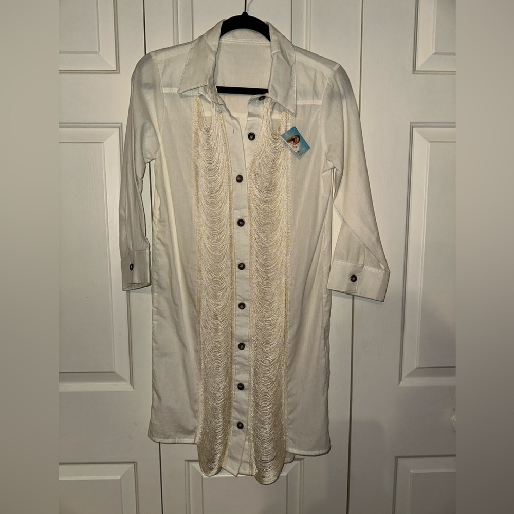 Cream colored beach cover-up size M three-quarter length sleeves